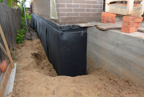 SJ Waterproofing Pros technician performing targeted Waterproofing assessment in Bayport, MN
